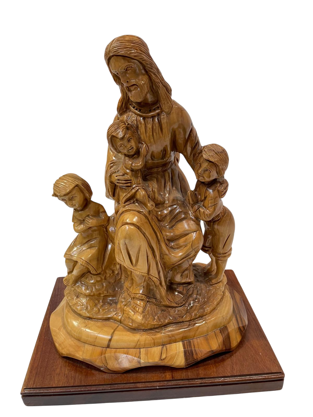 Jesús con niños de madera