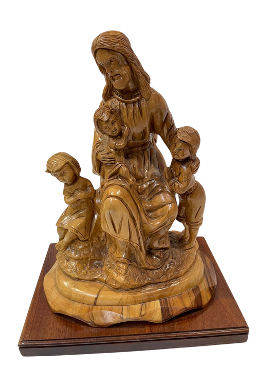 Jesús con niños de madera